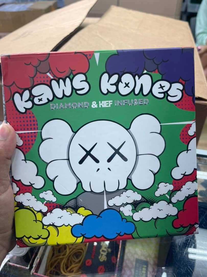 WhatsApp Image 2025-10-25 at 01.31.44_1cbf485b kaws hinged lid pre rolls child resistant tin box