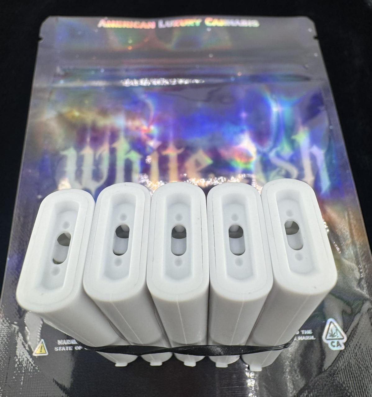 WhatsApp Image 2025-12-02 at 2.11.42 PM American luxury cannabis t2 live rosin 0.2g disposable